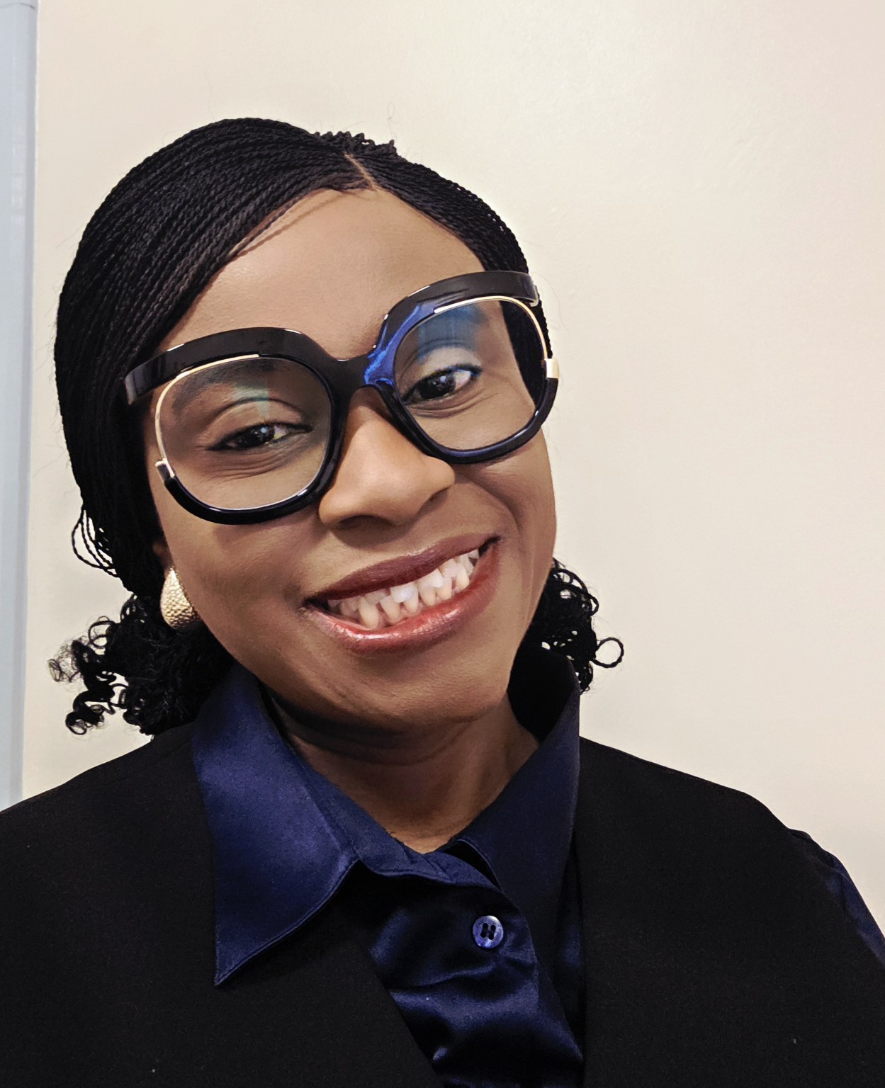 Seun Akinlua in professional attire